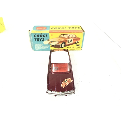 195 - A Boxed Corgi Citroen Safari #475 and a Rover 2000 #322. Boxes are worn.