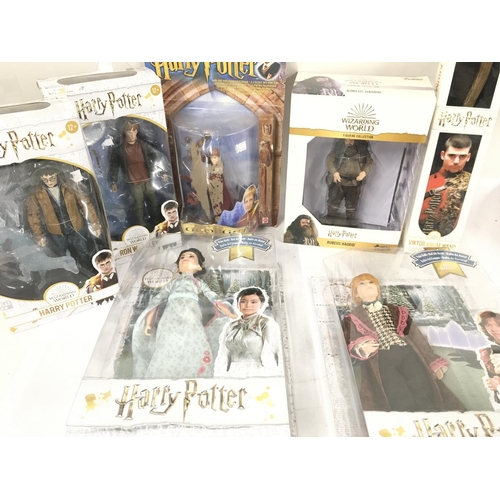 208 - A Collection of Harry Potter Figures. Books and other items.