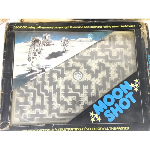 210 - A Collection of boxed Toys Including a Moon Shot.(4).