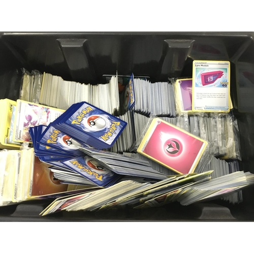 214 - A Box Containing a Collection of Modern Pokemon Cards.