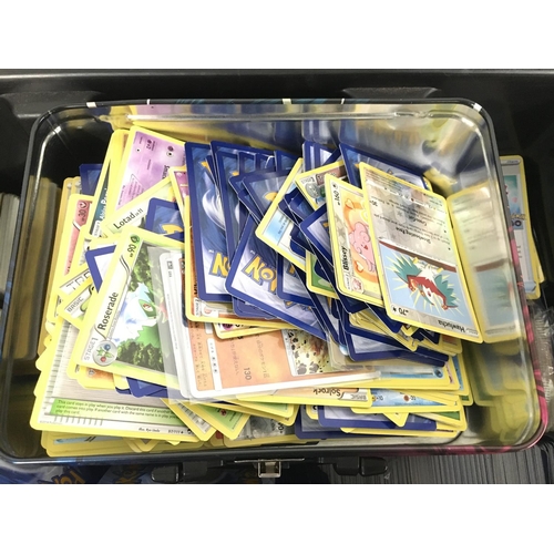 214 - A Box Containing a Collection of Modern Pokemon Cards.