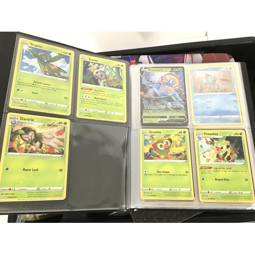 214 - A Box Containing a Collection of Modern Pokemon Cards.