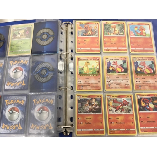 214 - A Box Containing a Collection of Modern Pokemon Cards.