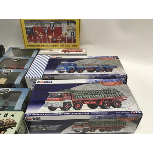 220 - Collection of 17 model cars and accessories by Corgi. Dinky. Atlas. Vanguard and Oxford. All in orig... 