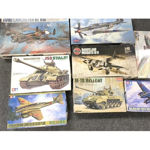 230 - A Collection of Various model kits including Planes and Tanks.