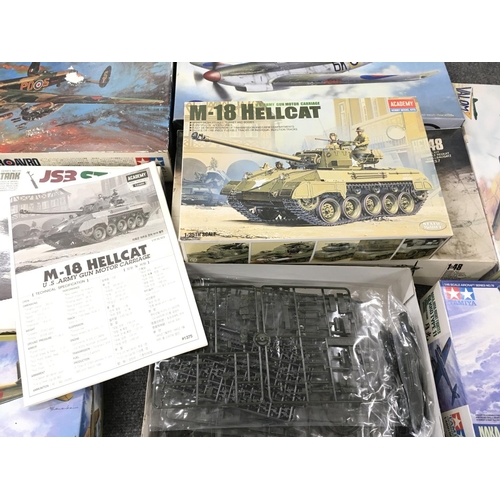 230 - A Collection of Various model kits including Planes and Tanks.