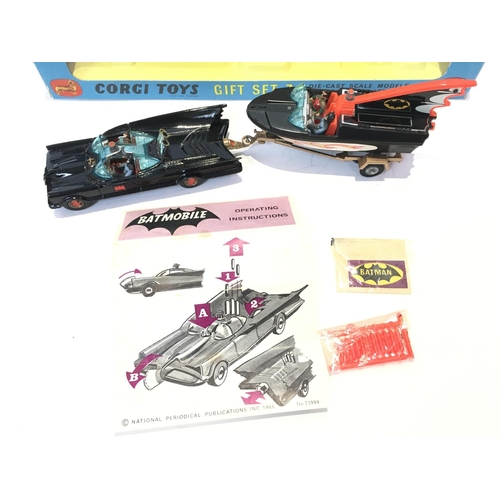 30 - A Boxed Corgi Gift Set 3. The Rocket Firing Batmobile and Batboat With Trailer.