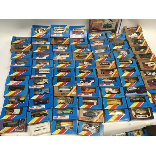 346 - A Collection of display boxed matchbox model cars, including some catalogues. (2)