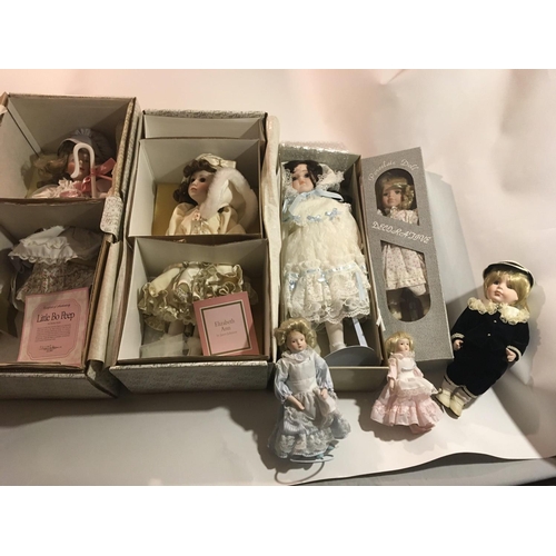 381 - A Collection of seven Collectable porcelain dolls.