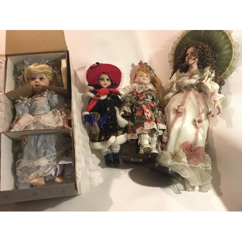 382 - A collection of four Collectable porcelain dolls.