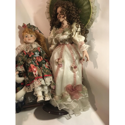 382 - A collection of four Collectable porcelain dolls.