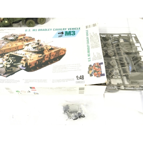 392 - Boxed and Other a loose Military Vehicles And Figures Including Corgi. Plus a Mechanised Tank kit Co... 