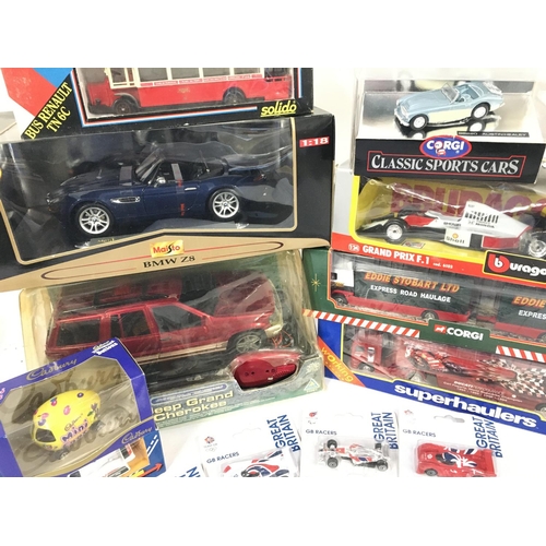 396 - A Collection of Boxed Die-Cast including Burago. Corgi etc.No Reserve.