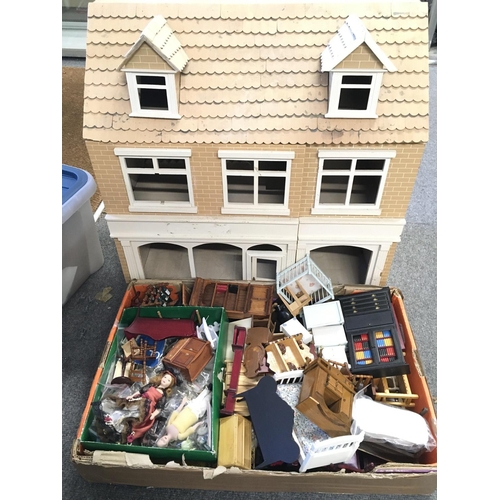 402 - A Dolls House. Approx height 60 cm in height. And a Quantity of Furniture. Lights. Fittings etc.(2).