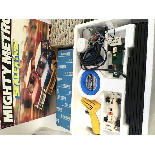 404 - A Boxed Scalextric Mighty Metro Set. Spate Track and 1 Other Set (no Box)