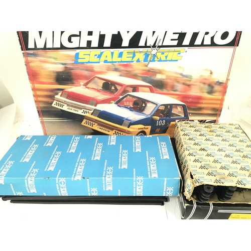 404 - A Boxed Scalextric Mighty Metro Set. Spate Track and 1 Other Set (no Box)