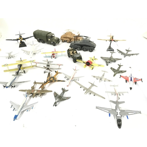 418 - A Box Containing Various Die-cast Aircraft and Military vehicles by Solido.