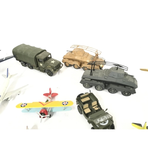 418 - A Box Containing Various Die-cast Aircraft and Military vehicles by Solido.