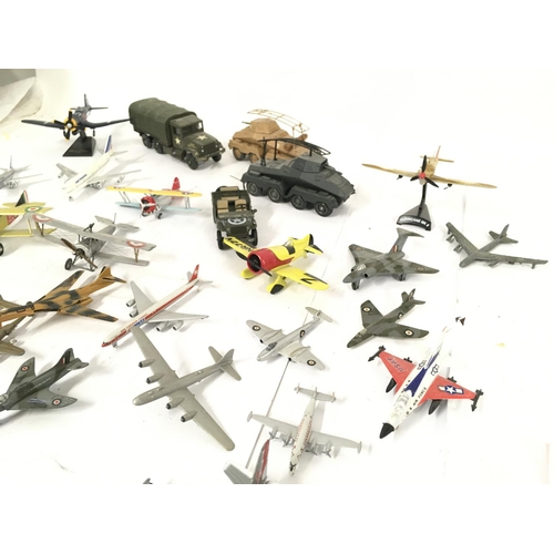 418 - A Box Containing Various Die-cast Aircraft and Military vehicles by Solido.