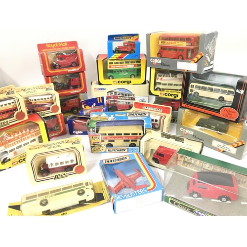 435 - A Collection of Boxed Die-Cast Buses and Vans etc.No Reserve.