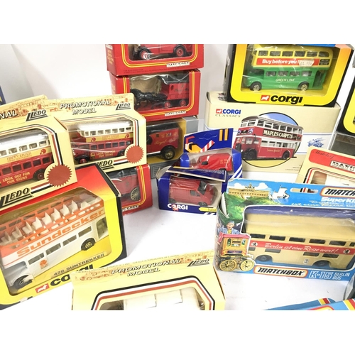 435 - A Collection of Boxed Die-Cast Buses and Vans etc.No Reserve.