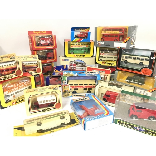 435 - A Collection of Boxed Die-Cast Buses and Vans etc.No Reserve.