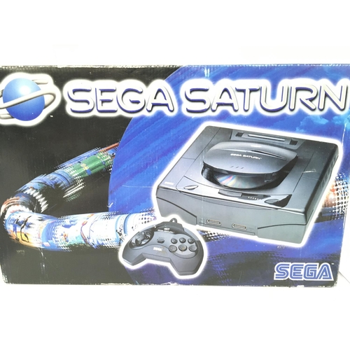 441 - A Boxed Sega Saturn With 4 Games.