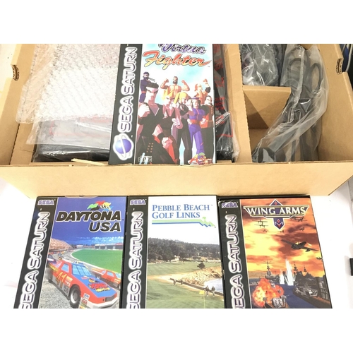 441 - A Boxed Sega Saturn With 4 Games.