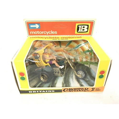 443 - A Boxed Britains Chopper Trike #9674. Damage to box.