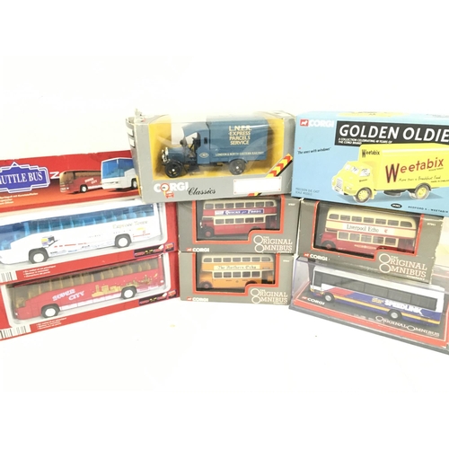 446 - A Collection of Boxed Di-Cast including Corgi Buses etc.