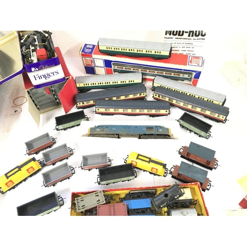 447 - A Box Containing a Collection of 00 Gauge Coaches. Wagons and Accessories including a Diesel Locomot... 