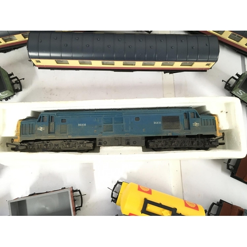 447 - A Box Containing a Collection of 00 Gauge Coaches. Wagons and Accessories including a Diesel Locomot... 