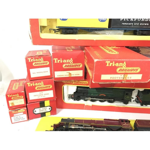 449 - A Box Containing a Collection of Tri-Ang 00 Gauge Boxed Accessories. 2 X Locomotives a Turntable etc... 