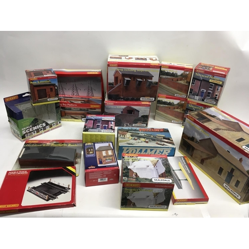 478 - A collection of boxed model railway buildings, mainly by Hornby. 00 scale.