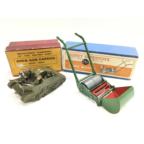 53 - A Boxed Britains Bren Gun Carrier and a Dinky Lawn Mower.