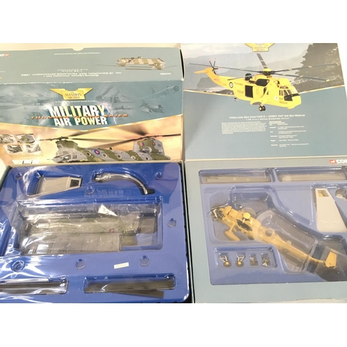 63 - 2 Boxed Corgi Helicopters. A Chinook #AA34202 and Sea King #AA33404.