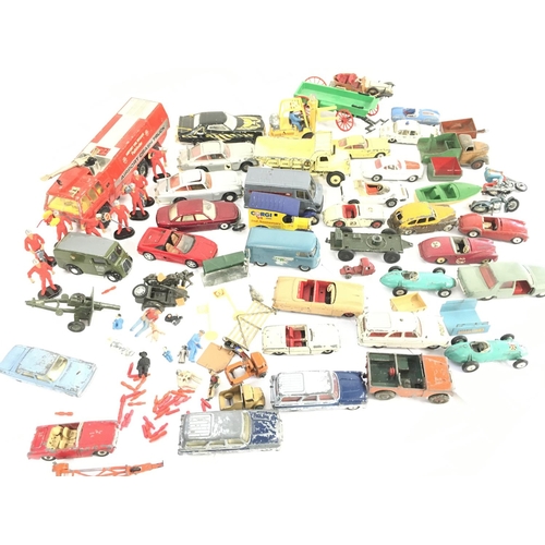 66 - A Collection of Playworn Die-Cast including Dinky. Corgi Etc. And Spare Parts and Figures.