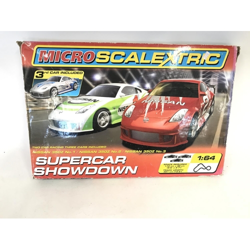 679 - Mirco scalextric supercar showdown. No reserve