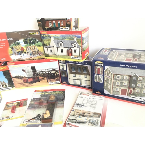 680 - 2 Boxes Containing a Collection of Boxed Hornby. Bachmann Boxed Buildings. And Kits.(2)