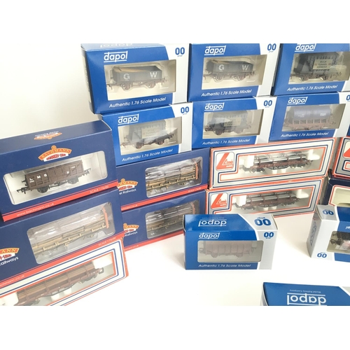 681 - A Collection of 00 Gauge Boxed Rolling Stock. Including Bachmann. Llima and Dapol.