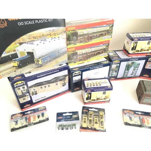 683 - A Collection of Bachmann. Hornby Boxed Buildings. Figures Etc.