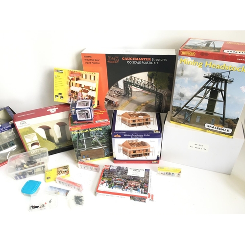 700 - A Box Containing A Collection of 00 Gauge Buildings Model kits Etc.