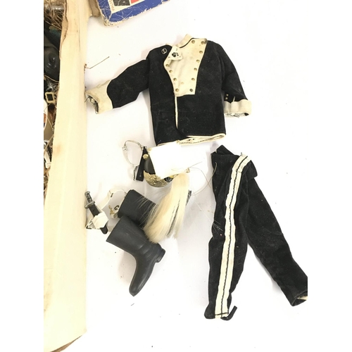 73 - A Boxed Palitoy Action Man Horse including a Lancers Uniform. Box is worn.