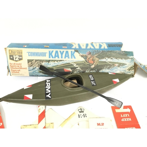 78 - A Boxed Cherilea Toys Commando Kayak and a action Man Sentry Box (Worn).