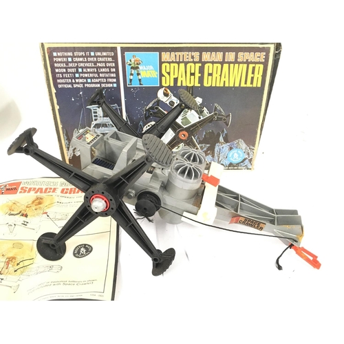 82 - A Boxed Vintage Mattel Man In Space Space Crawler. Box is worn.