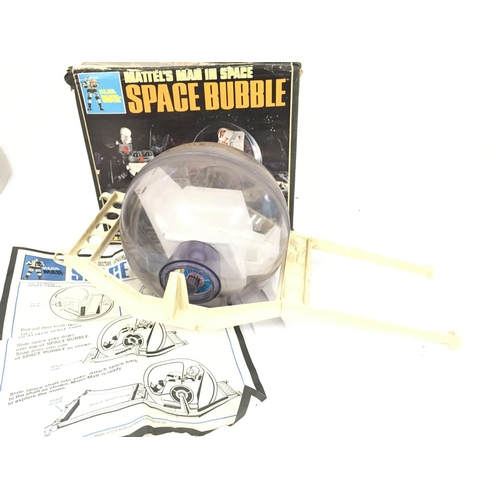 83 - A Boxed Vintage Mattel Man In Space Space Bubble. Box is worn. Pats Missing.