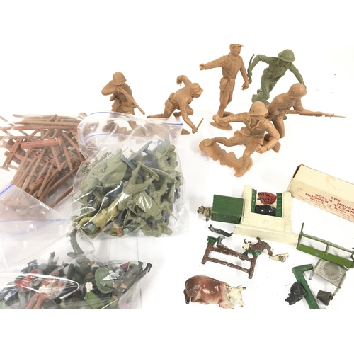 92 - A Box Containing A Collection of Various Plastic Toy soldiers including Timpo and Britains.