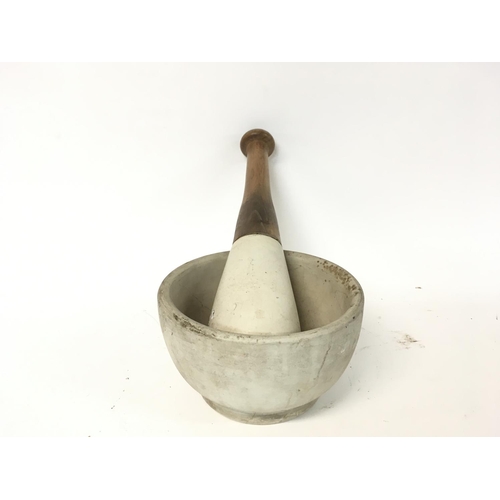 1004 - Large mortar and pestle, made in England