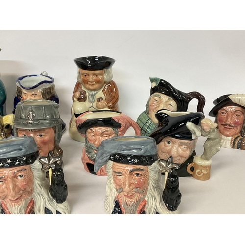 1044 - A collection of small Doulton, Staffordshire, Toby etc character jugs