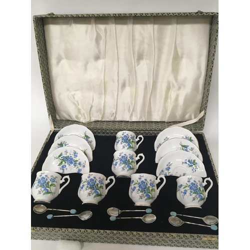 1093 - A Vintage Royal Albert English bone China coffee set the Forget me Not pattern. In a fitted presenta... 